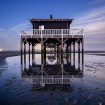 Photo des cabanes tchanquées après le coucher de soleil